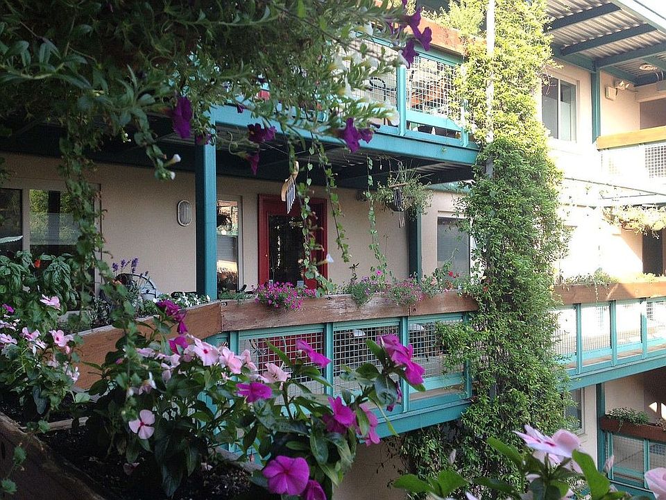 View of condo door opening to balcony