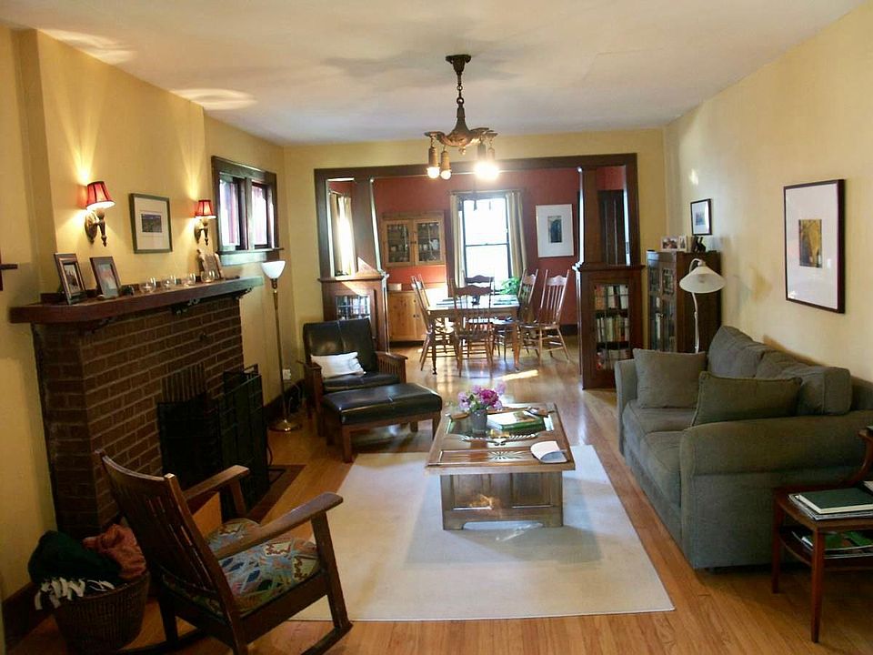 Sunroom looking into living room and dining room