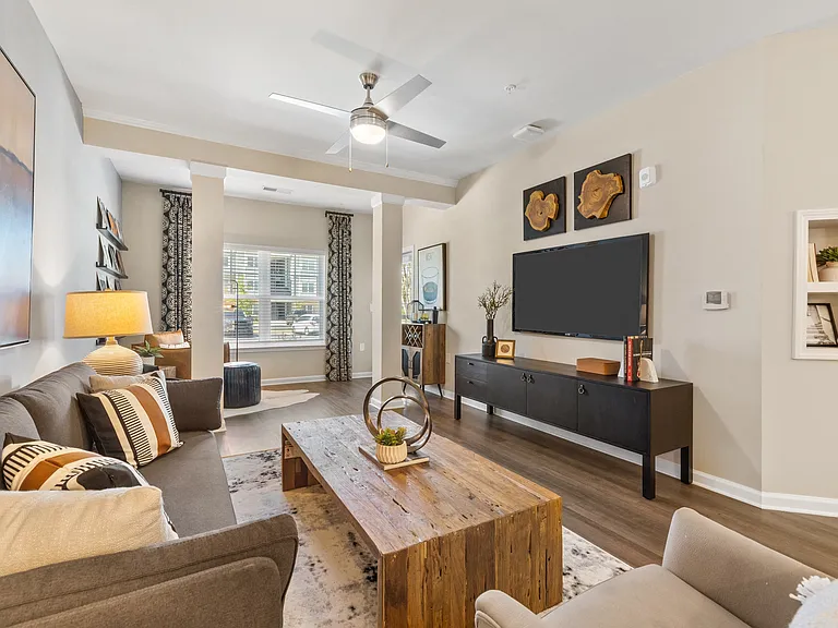 Langley Pointe Apartments | Living Rooms w/ Sunrooms