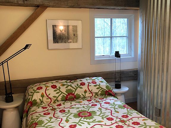 Bedroom with queen bed.