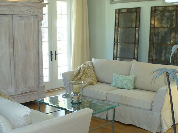 Lovely living room with french doors and fireplace.
