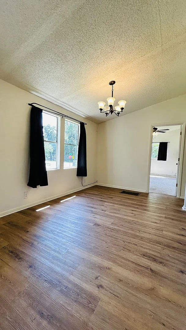 Charming 4-Bedroom Home on a Large Corner Lot — Photo 3