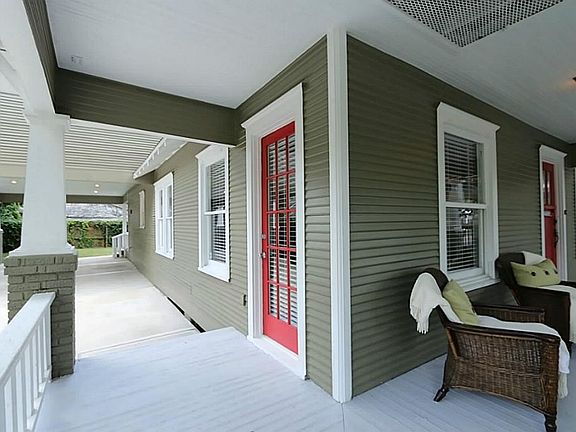The home features a gorgeous wrap-around front porch and convenient separate entrance to the home's 