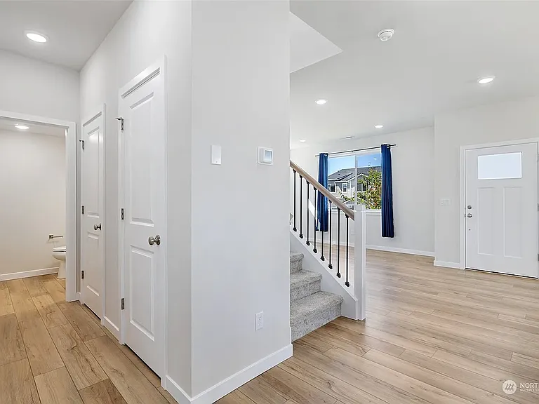 Level 1 - Nook, Powder, Stair Case, Living Room, West Entrance