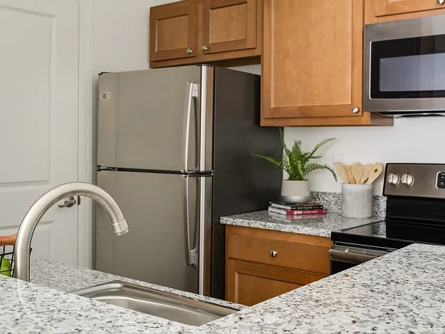 Enjoy Cooking in Our Upgraded Kitchen with Stainless Style Appliances at The Flatts Salisbury.