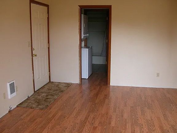 (Older photo just before getting new flooring baseboards put in)