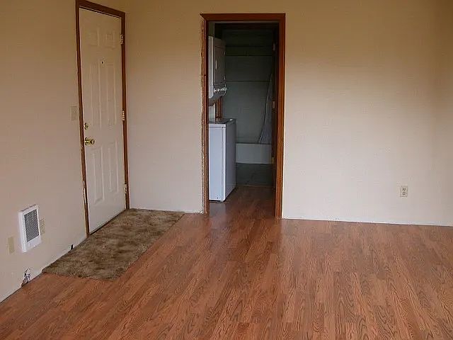 (Older photo just before getting new flooring baseboards put in)