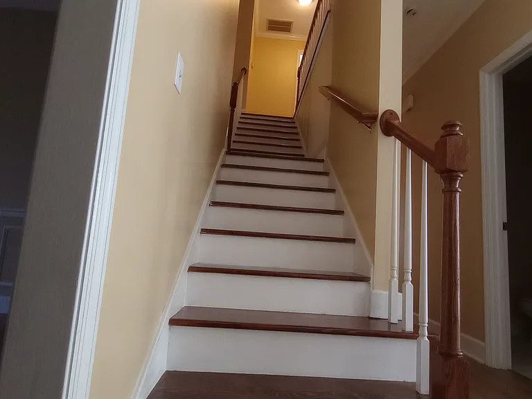 Stairs from garage and laundry room