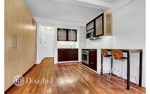 Sold by Douglas Elliman | media 11