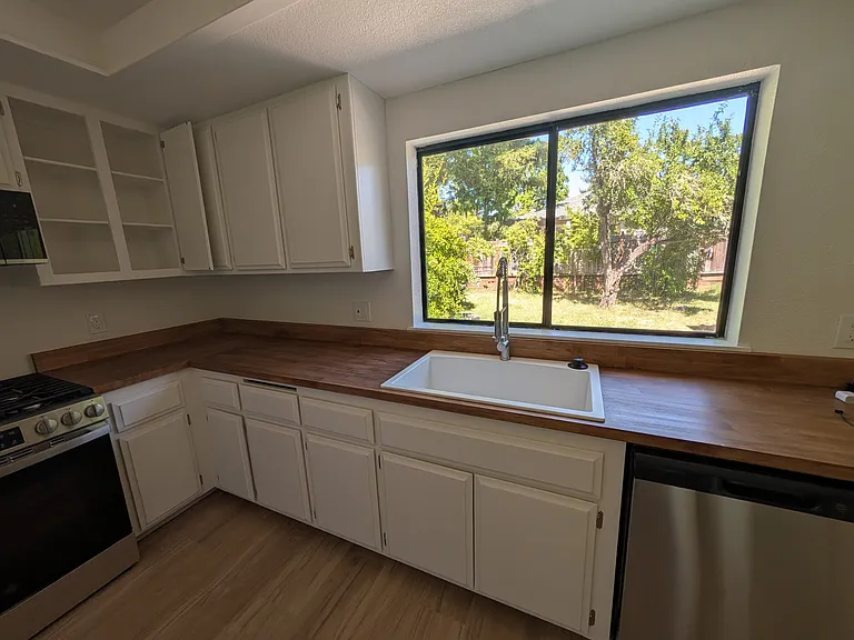 Kitchen with a view of the backyard.