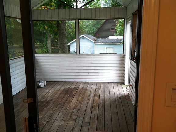 Screened in porch off kitchen
