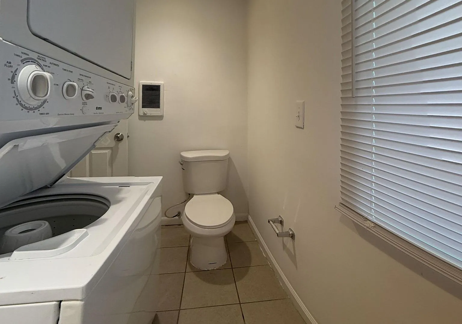 Charming 4BR/2BA Rowhouse with Hardwood-Style Flooring Throughout — Photo 2