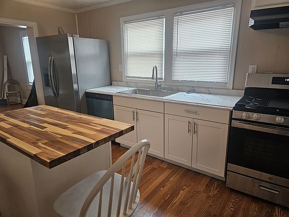 Kitchen wall with appliances.
