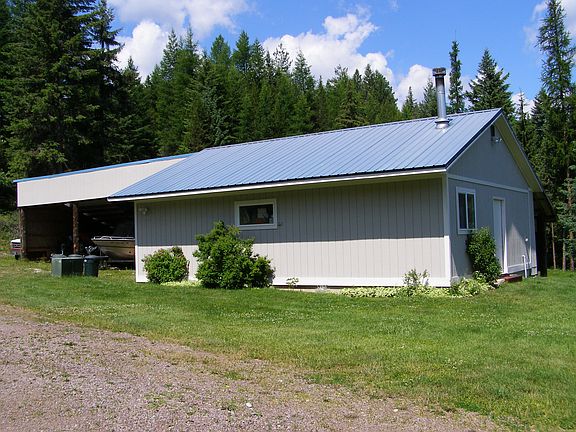 Garage/Shop/3 Stall Carport