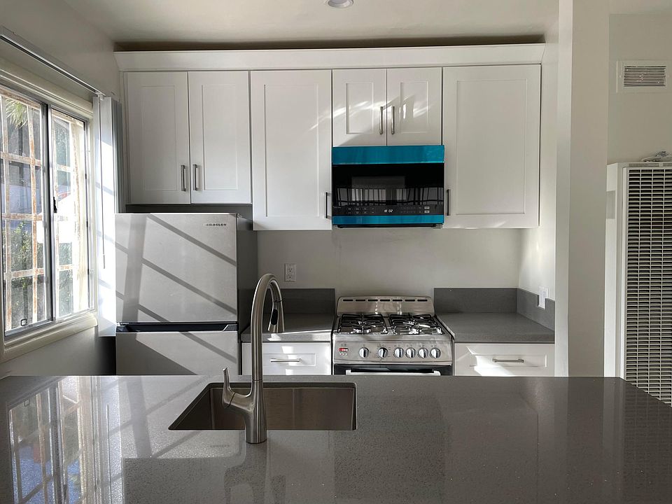 Kitchen with microwave over range