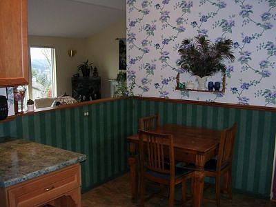 Enjoy the view out the front or back from the kitchen eating area