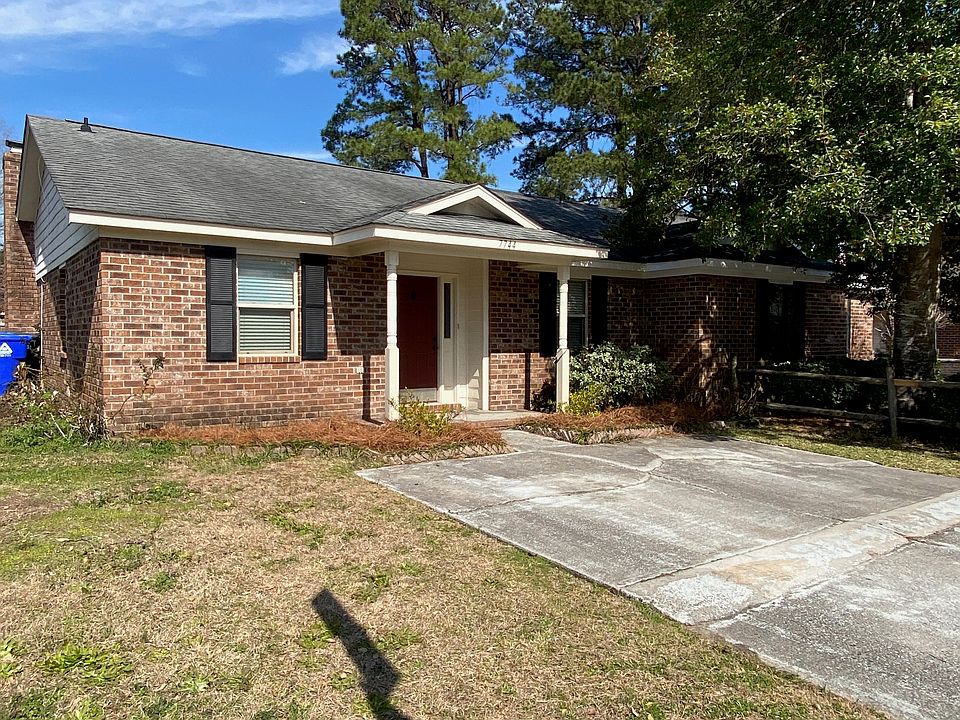 Front with covered porch and two off-street parking spaces