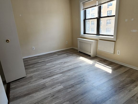 Alcove for bed. Enough space for queen bed. Has great closets.