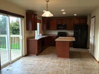 Kitchen, dining, back slider to new finished deck