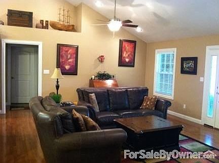 Living Room View
						:
						Open floor plan with plant shelving on both sides. Hardwood and tile flooring.