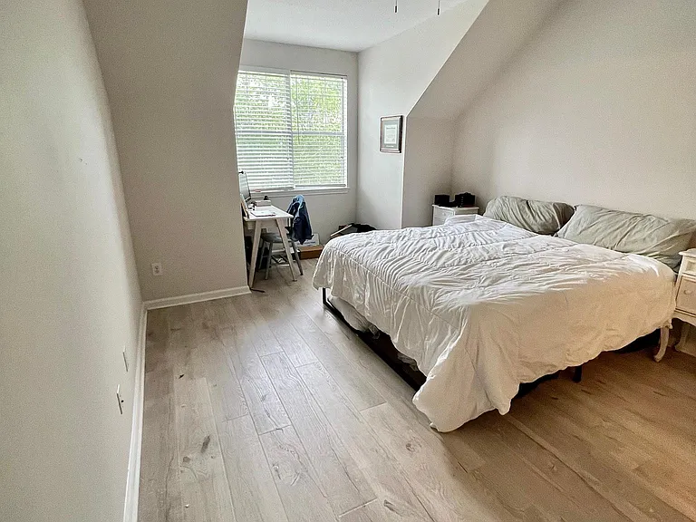 Master bedroom, extremely large with a nook for desk or sitting area.