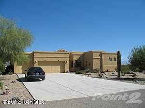 3 car garage with oversized driveway.