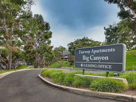 Exterior sign with apartment name.