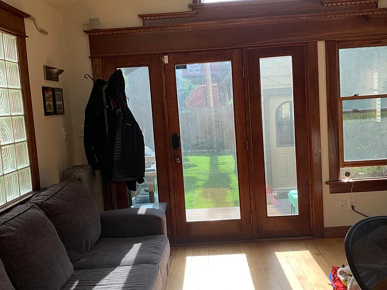 sunroom is great for home office, kids playroom or family room
