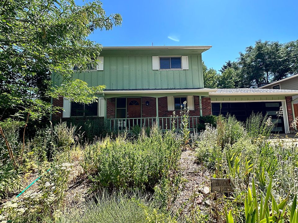 House has plenty of parking and a xeriscaped yard