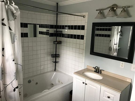 Master bathroom with large jetted tub