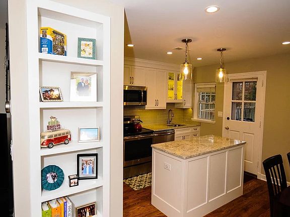 Complete first floor remodeled including hardwood throughout, built-ins, canned lights, and updated kitchen!