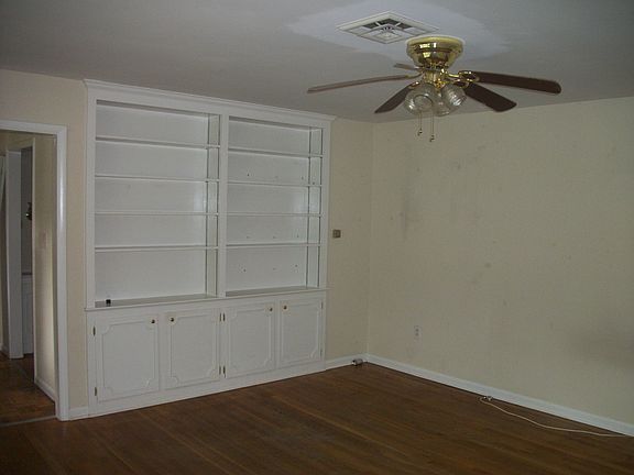 Living room with built in book shelves