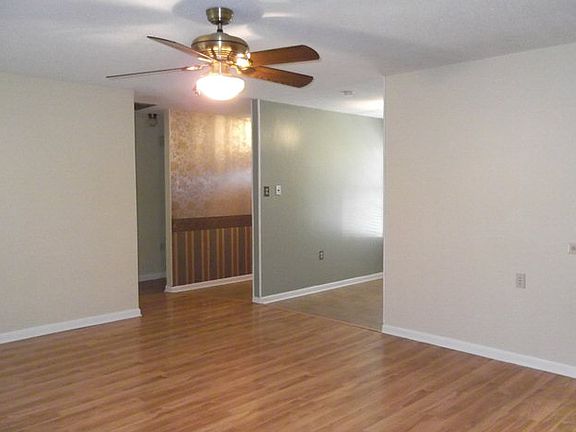Your view from the living room to the foyer & dining area.