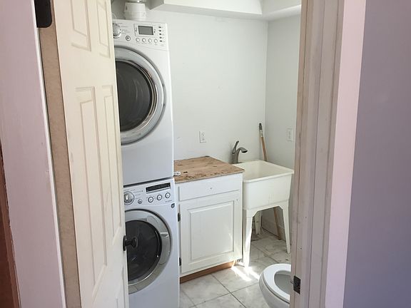1.5 bath with washer/dryer basement door is here also