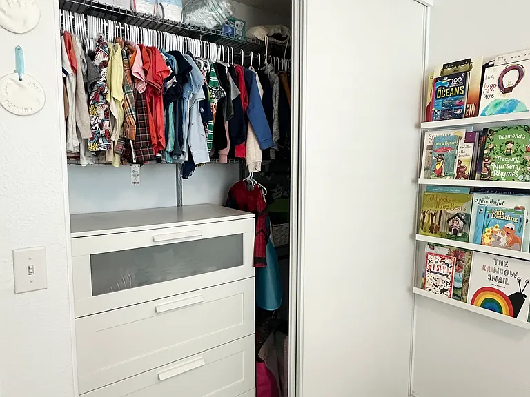 Closet - left side. Closet system can be modified.