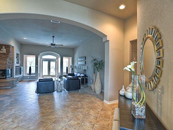 Tile runs from the front door, thru the halls, family room, kitchen and breakfast.