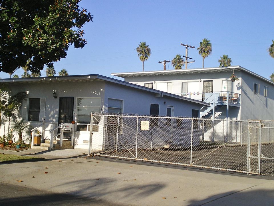 Newly painted exterior. Courtyard between buildings for get togethers!