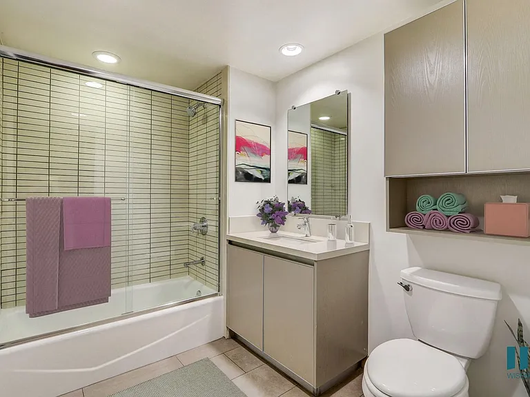 Bathroom with Shower-Bath with Cabinet Storage