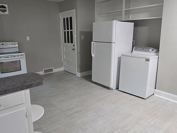 Front of Kitchen to door to garage