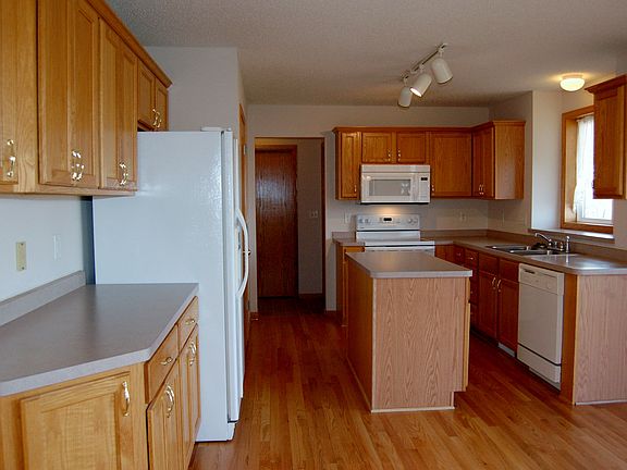 Great kitchen with extra counter space and cabinetry.