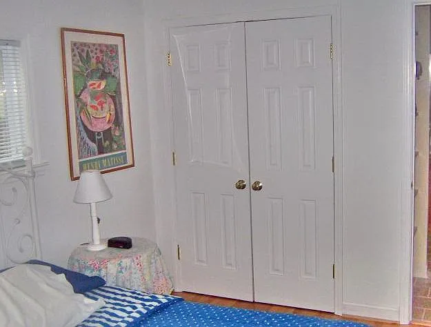 Bedroom and double door closet