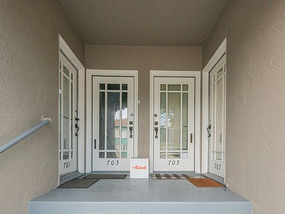 Front entrance. Unit entrance on the side/ left