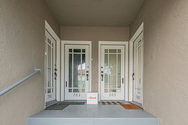 Front entrance. Unit entrance on the side/ left