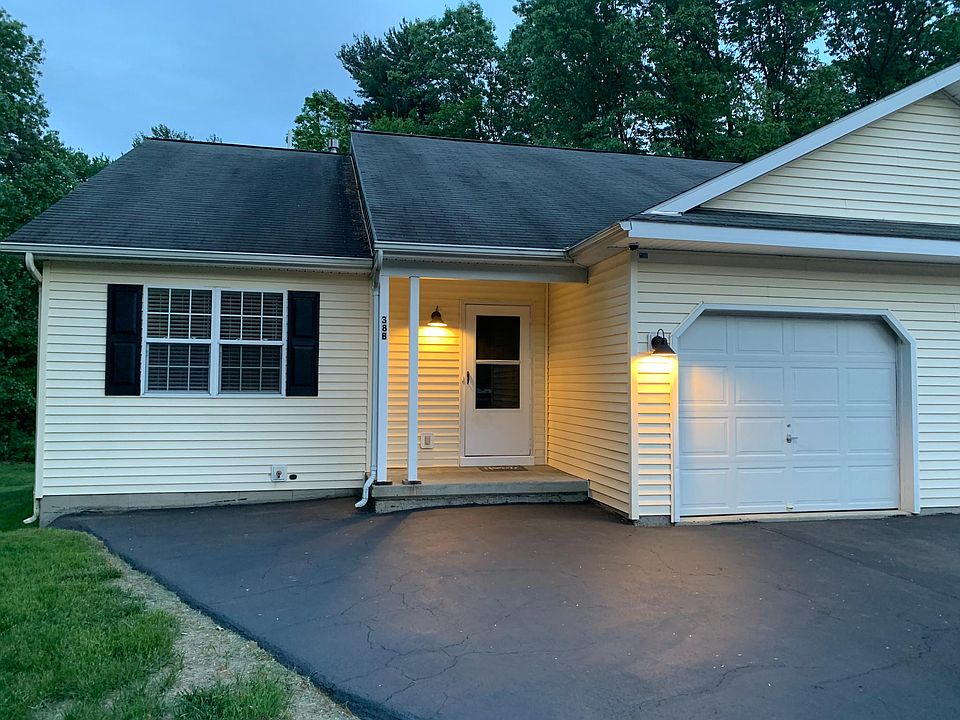 Front Door, Garage Entrance and Driveway