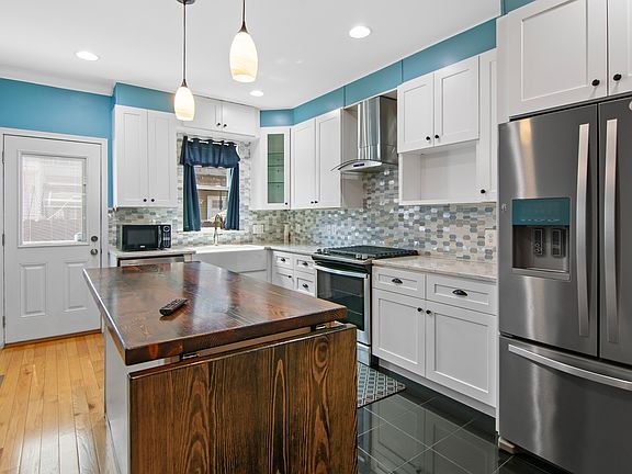 Remodeled kitchen with extendable island table