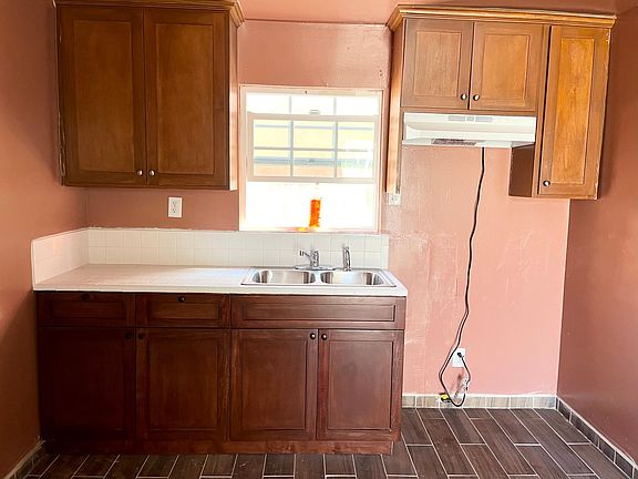 Newly installed cabinets in kitchen space