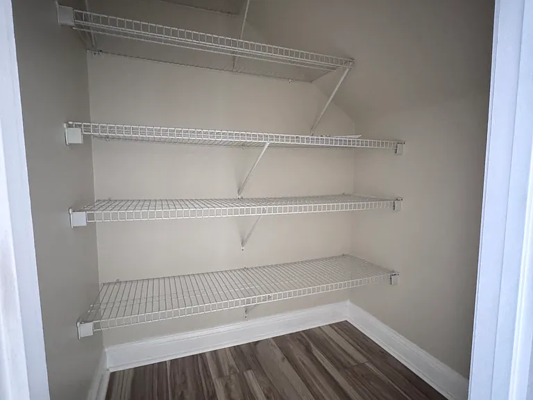 Under stairs storage room.