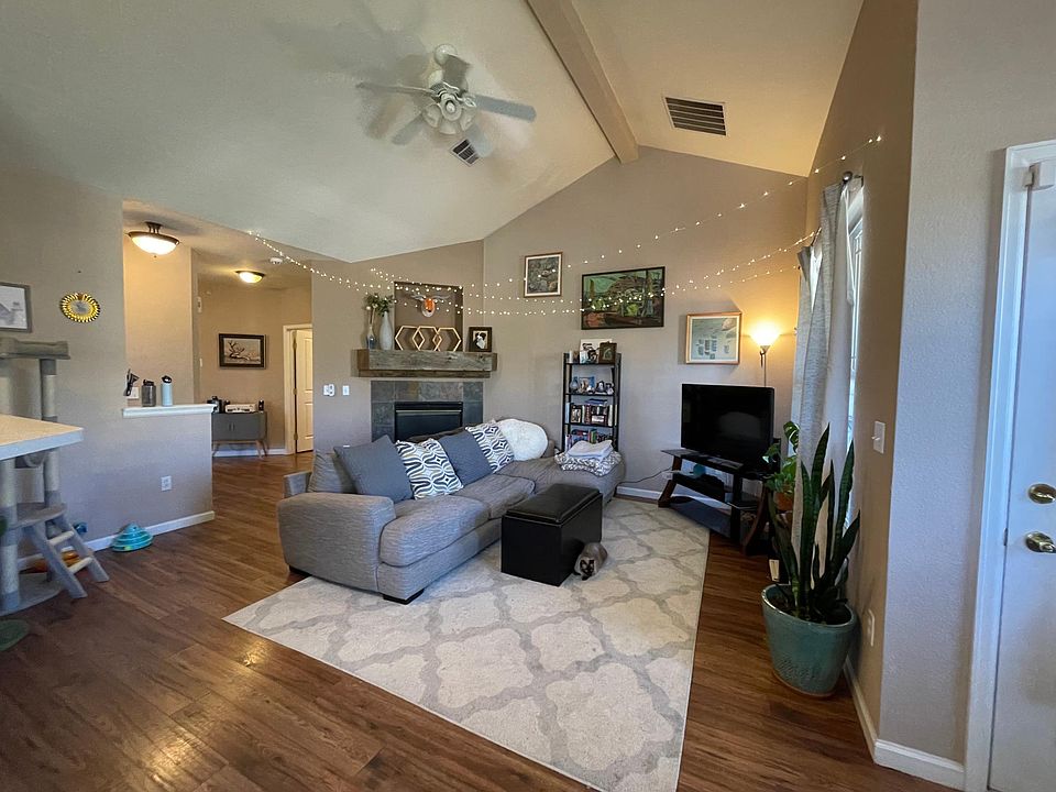 Large living room with valuted ceiling.