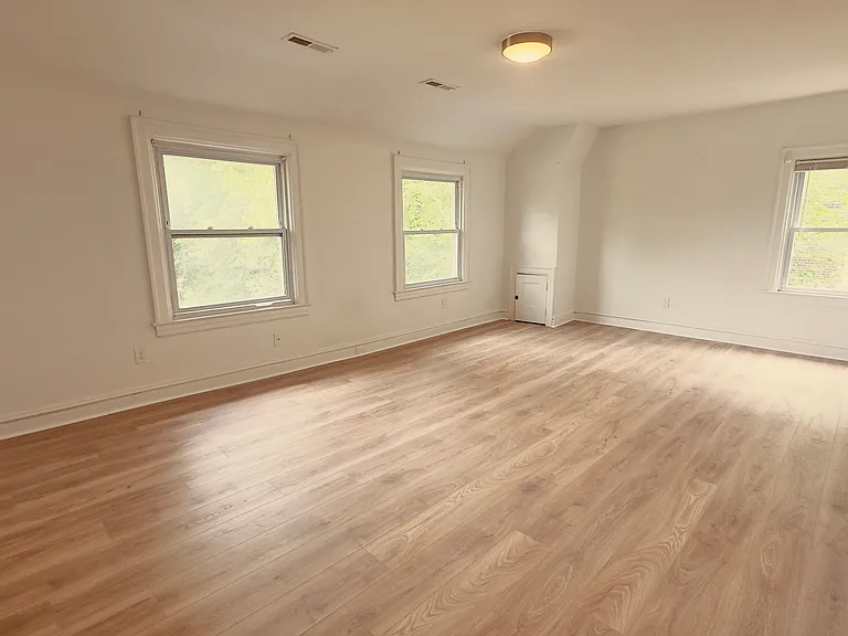 Bright and Airy Bedroom from a Different Perspective