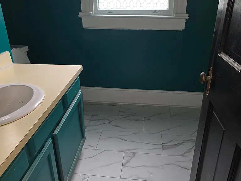 Bathroom updated floors and vanity